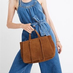 • Madewell • “The Elsewhere tie crossbody tote” with colorful guitar strap.